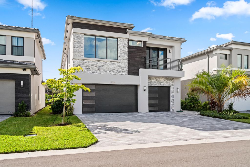 Photo of 8258 Essex Country Club Drive, Boca Raton, FL 33434 (MLS # R11129305)