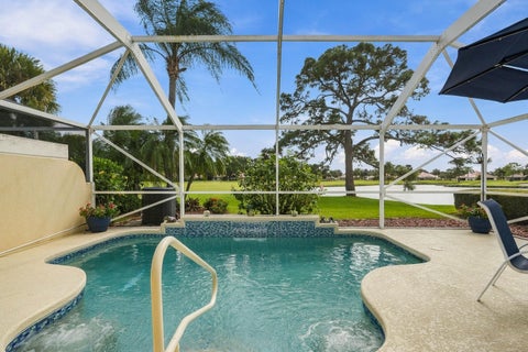 Photo of 1004 SW Tamarrow Place, Stuart, FL 34997 (MLS # B26093692)