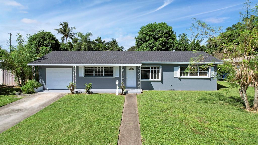 Photo of 427 Australian Circle, Lake Park, FL 33403 (MLS # R11029419)