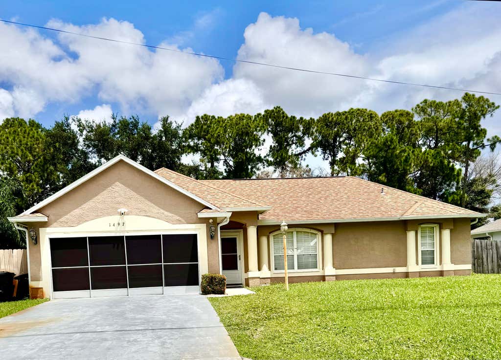 Photo of 1497 SW Wepaco Avenue, Port Saint Lucie, FL 34953 (MLS # B26061689)