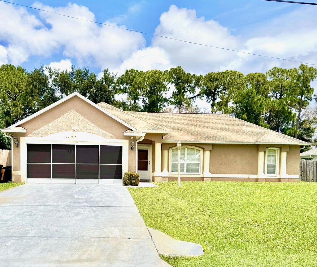 Photo of 1497 SW Wepaco Avenue, Port Saint Lucie, FL 34953 (MLS # B26061689)