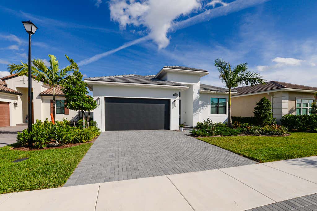 Photo of 9482 SW Pepoli Way, Port Saint Lucie, FL 34987 (MLS # R10941133)