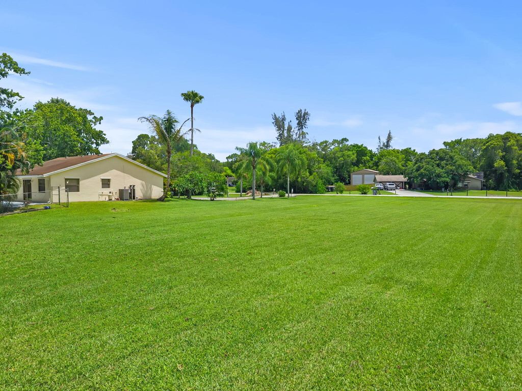 Photo of 13835 49th Street N, West Palm Beach, FL 33411 (MLS # B26044162)