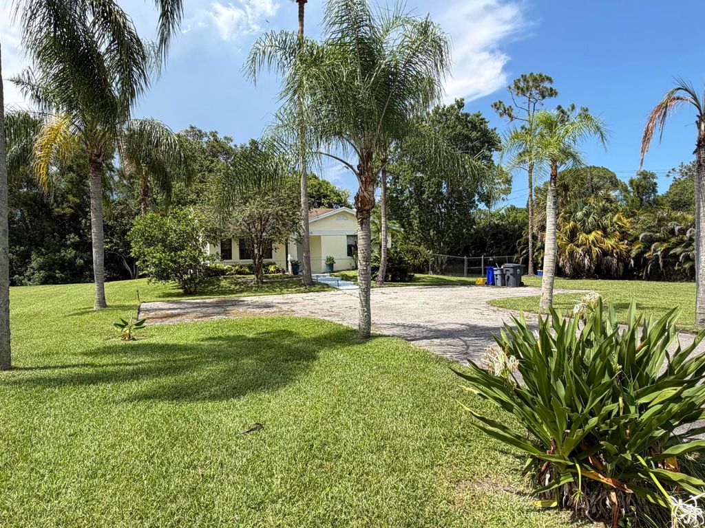 Photo of 13835 49th Street N, West Palm Beach, FL 33411 (MLS # B26044162)