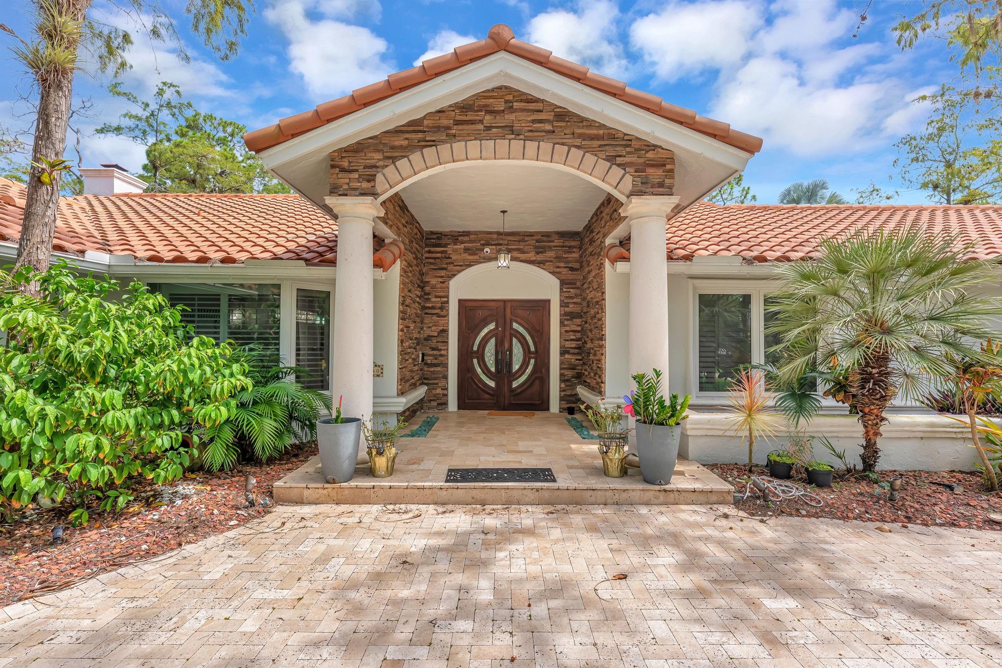 This home has too much to fit into the limited space provided - please see attachments for full feature list. Incredibly improved home in the prestigious Whispering Woods community of Coral Springs. Beautiful, bright, and incredibly curated interior guides you to an impeccably peaceful exterior. Solar panels done incredibly, creating energy bill as low as $30 while powering the immense amounts of upgrades and tech. 2007 roof, 68 solar panels, 2022 3 ton A/C coupled with 2023 5 ton A/C, mini-split A/C in both garage areas, privacy hedges on the vast majority of the property creating a perfect sanctuary.