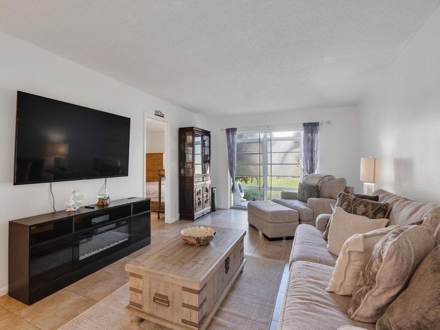 BOTTOM FLOOR UNIT just minutes away from the beach. Recently renovated kitchen and bathrooms. Tile throughout. 2022 AC & water heater. 2022 Kitchen appliances. New plumbing. CBS building painted 3 years ago, roof 3 years old. Monthly HOA includes water and trash pick up. Current tenant pays $1,700 a month, lease expires 08.2026.