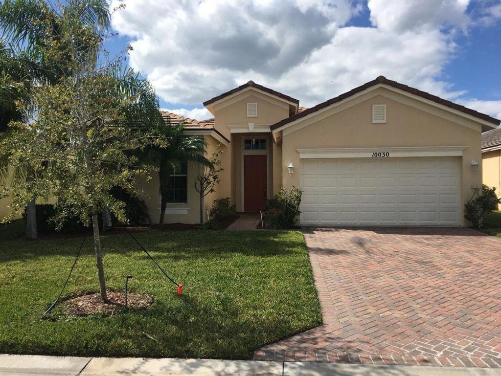 Photo of 10030 SW Cardigan Circle, Port Saint Lucie, FL 34987 (MLS # R10730416)