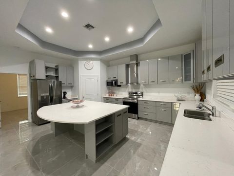 Photo of 1711 SE Airoso Blvd, Port Saint Lucie, FL 34984 (MLS # F10528395)