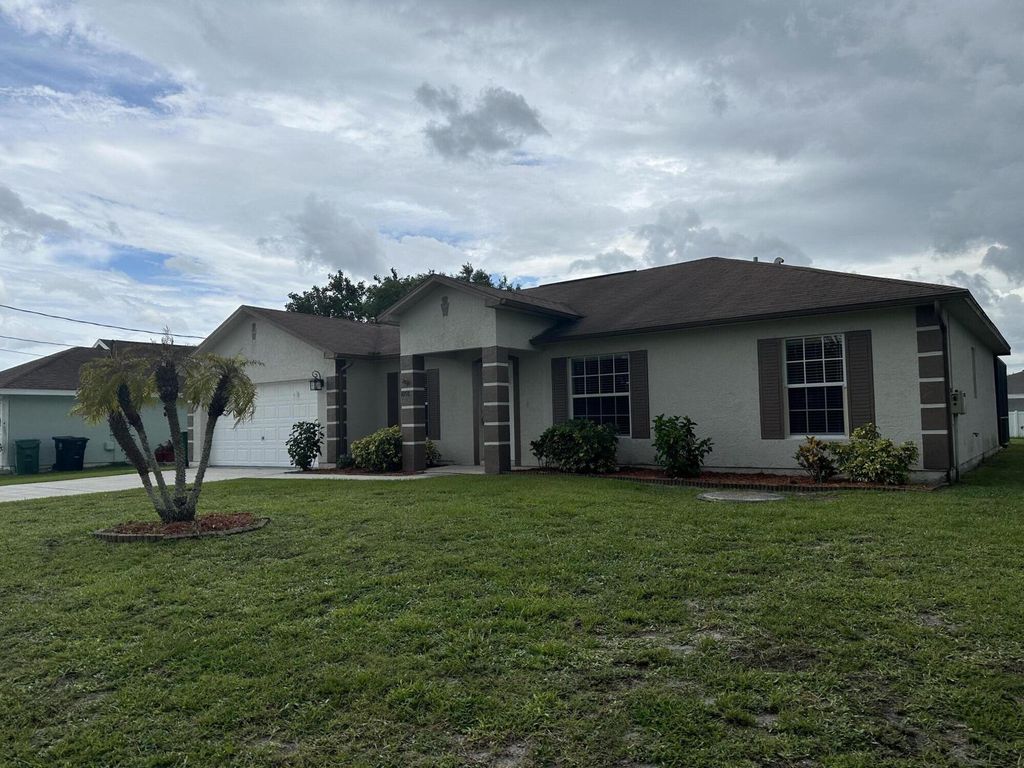 Photo of 1058 SW Provincetown Lane, Port St Lucie, FL 34953 (MLS # R10895940)