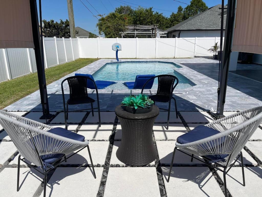 Photo of 1692 SW Paddock Street, Port Saint Lucie, FL 34987 (MLS # R11128699)
