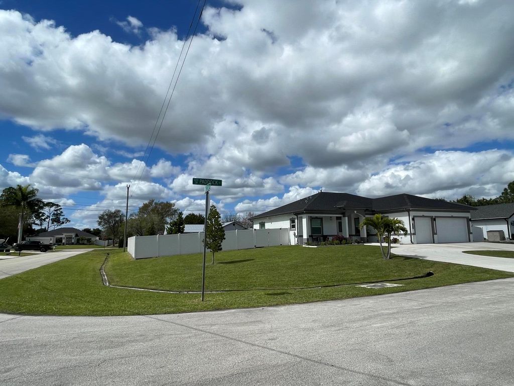 Photo of 1692 SW Paddock Street, Port Saint Lucie, FL 34987 (MLS # R11128699)