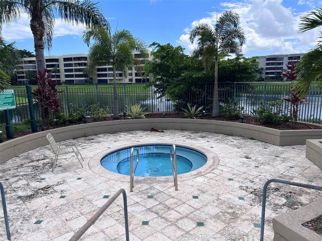 Photo of 1865 Palm Cove Boulevard #302, Delray Beach, FL 33445 (MLS # F10400172)