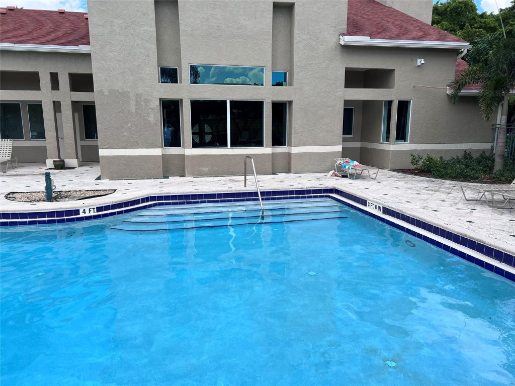 Photo of 1865 Palm Cove Boulevard #302, Delray Beach, FL 33445 (MLS # F10400172)