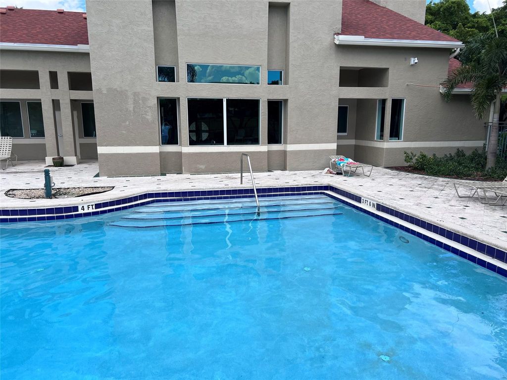 Photo of 1865 Palm Cove Boulevard #302, Delray Beach, FL 33445 (MLS # F10400172)