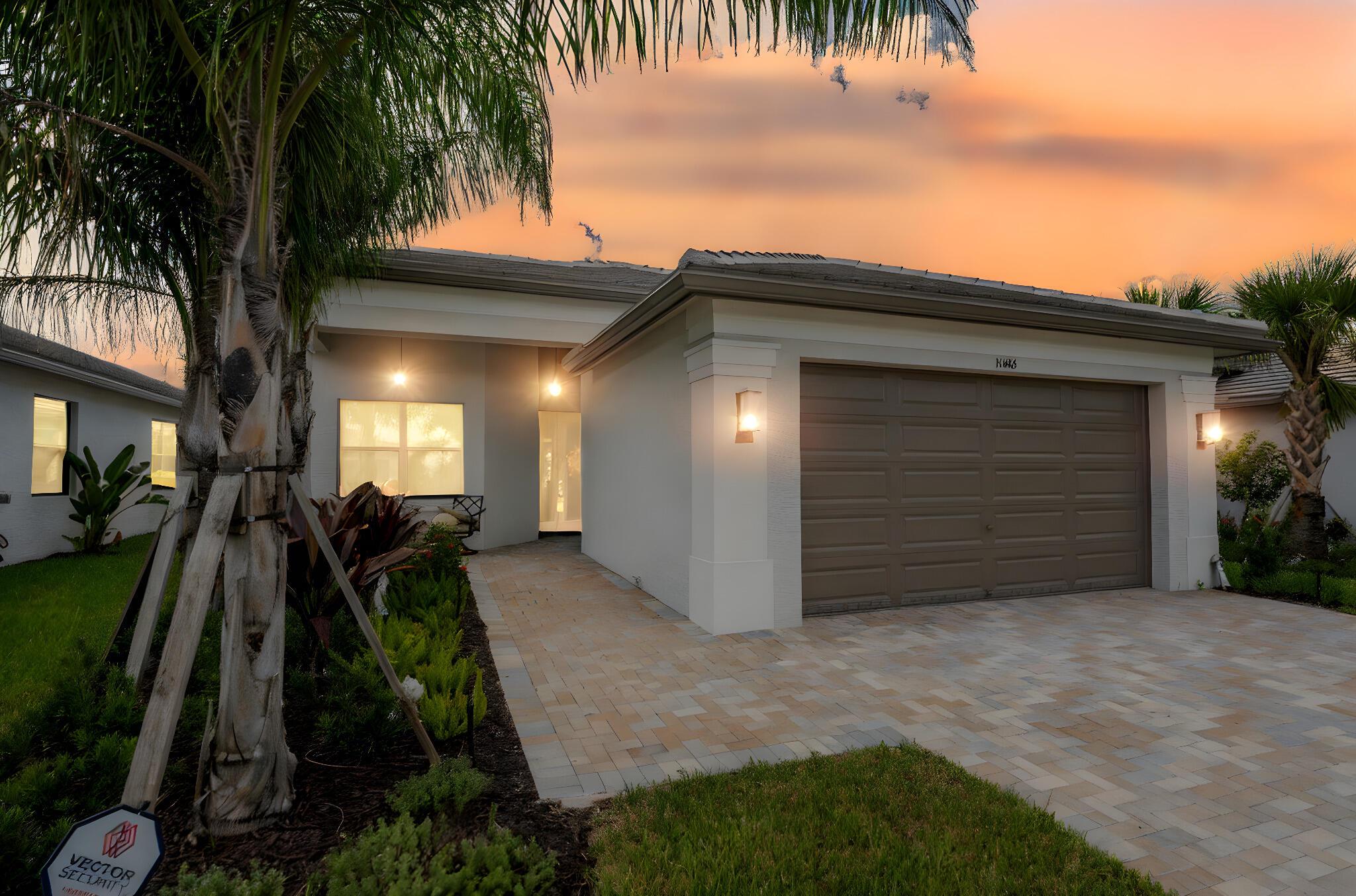 The Walk at Riverland! 2024 built Sierra model! Popular open concept 3-bedroom, 2-bathroom home offers 2,064 square feet of stylish living space. Beautifully designed granite island kitchen, 42 inch white shaker cabinets w/ pull-out drawers & lighting, tiled backsplash, stainless appliance and upgraded gas range. Light & bright great room w/windows and sliding glass doors across the back of the house. Huge master suite with large walk in shower, dual vanity counters, dual closets. Upgraded tile flooring throughout! Relax on the private screened porch and extended pavered lanai overlooking the back yard. Plenty of room for a POOL! You'll love the thoughtful upgrades that include: luxury remote shades, wide paver driveway, tankless water heater, outdoor kitchen plumbing, whole-house gutters