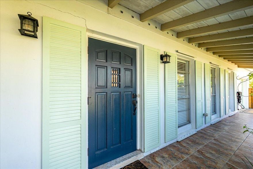 This tastefully designed home is Move-In Ready! Located in the sought after and very quiet and friendly community of Vero Shores. With no HOA dues, it's adjacent to the Harmony Oaks Conservation Preserve. Also Minutes from the beach and the Indian River for Ocean Access. Remodeled in 2022 with granite counters, herringbone tile backsplash, custom soft-close cabinets and trim work throughout, floors, tiled screened patio, updated bathrooms and electrical. Plumbing is completely re-piped, and there is a dedicated generator line. Relax in the peaceful butterfly garden with  producing mango & avocado trees and a pool with a serene nook for lounging. NEW A/C 2024 A Must See!