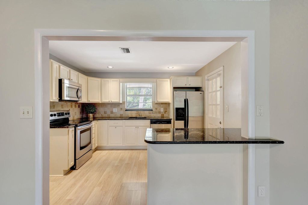 Photo of 10789 N Military Trail #6, Palm Beach Gardens, FL 33410 (MLS # B26020764)