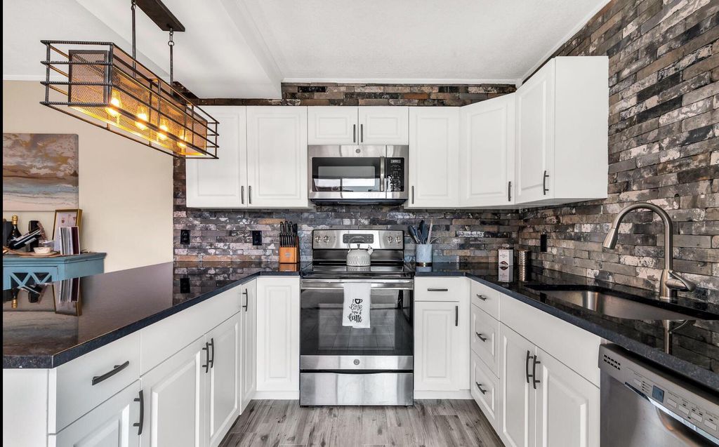 Photo of 3167 Gardens East Drive #A, Palm Beach Gardens, FL 33410 (MLS # R11087731)