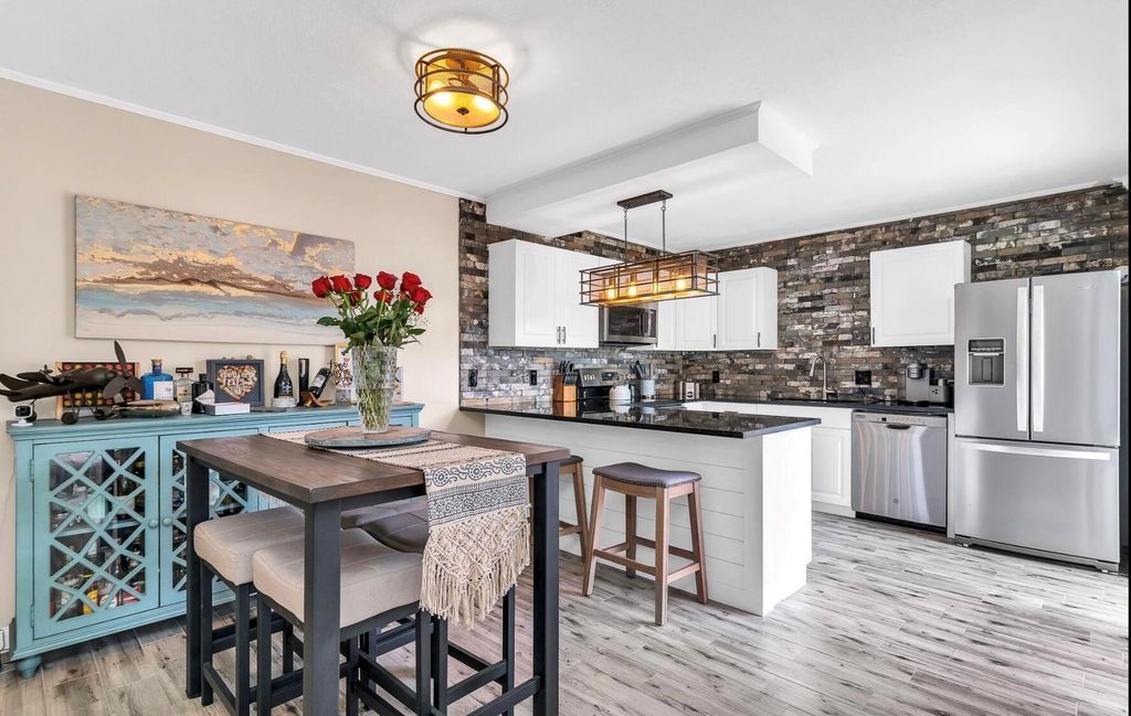 Photo of 3167 Gardens East Drive #A, Palm Beach Gardens, FL 33410 (MLS # R11087731)