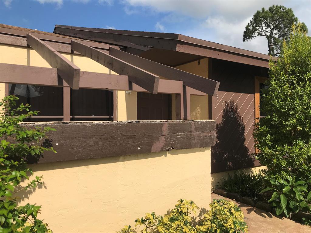Gorgeous move in ready home!!! 2 beds with 2 full bathrooms, End Unit with fenced in backyard. Screen/covered patio with its own private pool. Tile throught the whole unit. Unit features: Newer Roof and AC, hurricane panels, double driveway, large laundry room with washer and dryer, smaller private pool, larger community pool and recently remodeled kitchen .