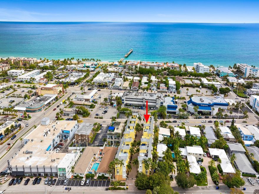 Just steps to the pier in Lauderdale By The Sea, resides this stunning (gated) boutique 3 bedroom / 3.5 bath 1782 sf townhome! 1st level boasts a private guest suite/home office/ gym; laundry & private garage entry. The main living space on the 2nd level offers exquisite hardwood floors & an open floor plan seamlessly blending living/dining areas, a gorgeous light-filled Chef's kitchen w/pantry, open-air balcony & powder rm. 3rd level owner's suite w/French door balcony & lux spa bath creates a welcoming retreat! Additional guest room & full bath are also located here. The crown jewel? Your private rooftop deck—perfect for entertaining or unwinding under the stars. 1 Exterior Dedicated Parking Space / Pet Friendly / INCREDIBLY LOW HOA FEE!!