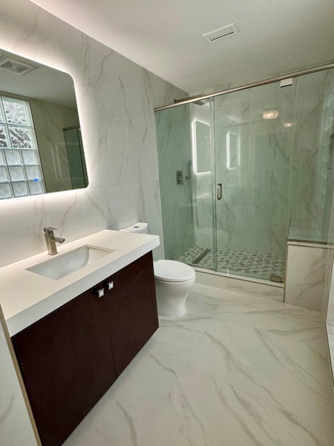 Tiny photo for 1127 Boca Cove Lane, Highland Beach, FL 33487 (MLS # B26008459)