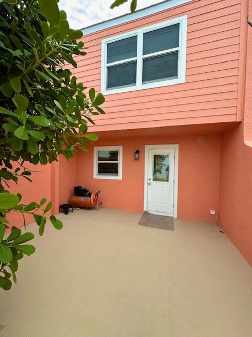 Walk to Beach location! Across the street from State Park. Kayak, paddle board and boat launch locations all around townhouse. Two-bedroom 1.5 bath unit with Back patio and side yard. All new appliances and ac. Freshly painted inside and out. New carpets and other upgrades. Building updated with new siding, paint and roof. Annual rental available November 1, 2025. Looking for long term tenant.  Would consider shorter term also. Furnished or unfurnished.