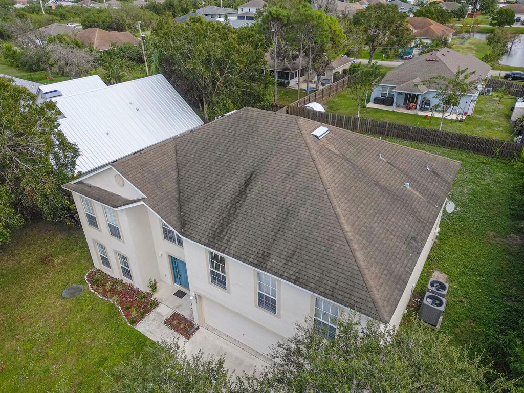 Photo of 4671 SW Carib Street, Port Saint Lucie, FL 34953 (MLS # R11038542)