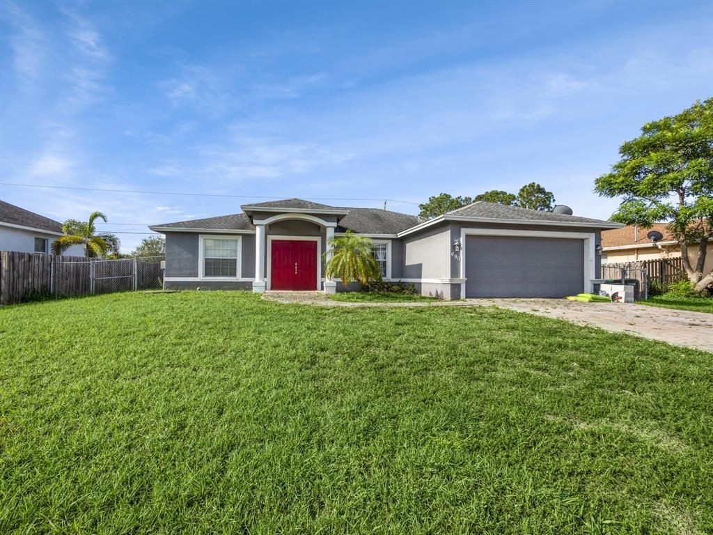 Photo of 490 SW Laconic Avenue, Port St Lucie, FL 34953 (MLS # R10887793)