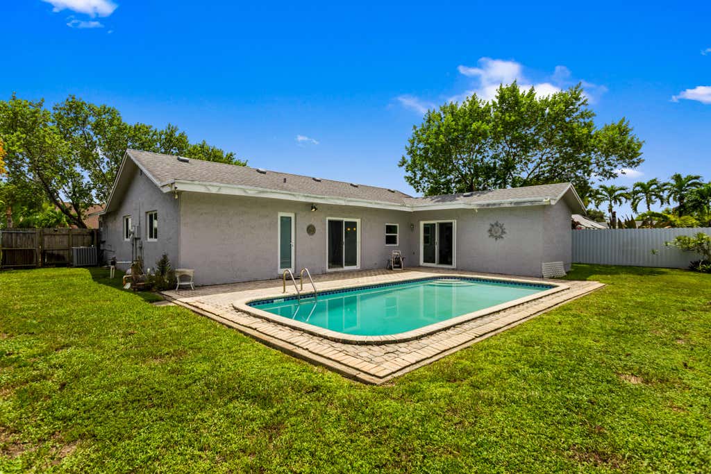 Photo of 8621 NW 3RD Street, Pembroke Pines, FL 33024 (MLS # B26067941)