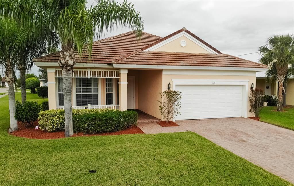 Photo of 154 NW Willow Grove Avenue, Port Saint Lucie, FL 34986 (MLS # R10758529)