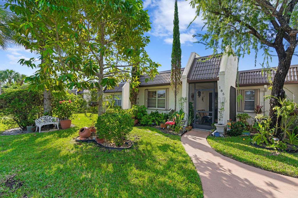 Photo of 185 Lake Susan Lane, West Palm Beach, FL 33411 (MLS # R10850568)