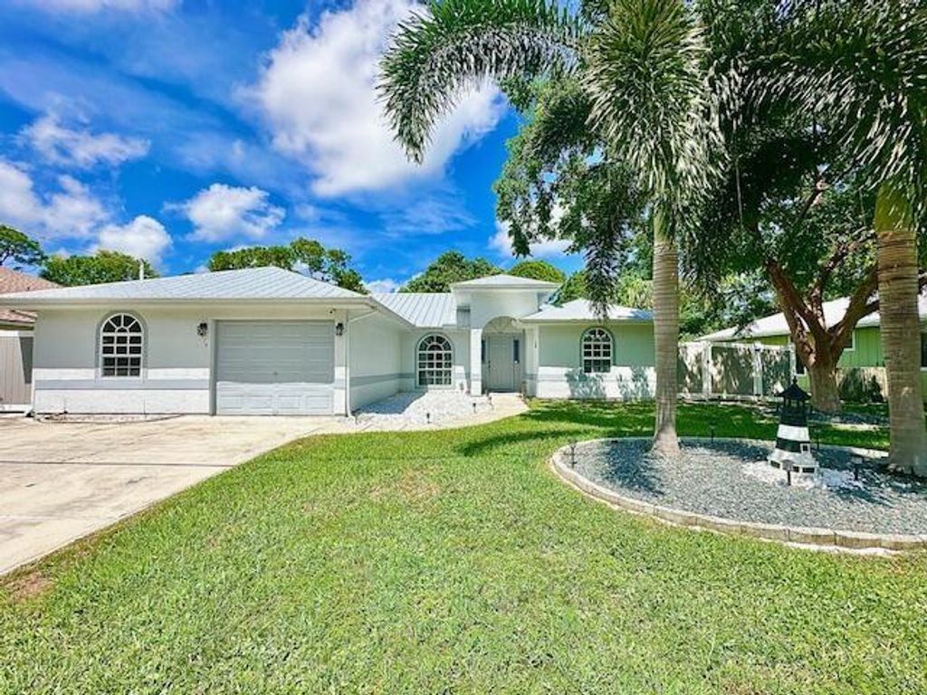 Photo of 2279 SE Blossom Road, Port Saint Lucie, FL 34952 (MLS # R11127311)