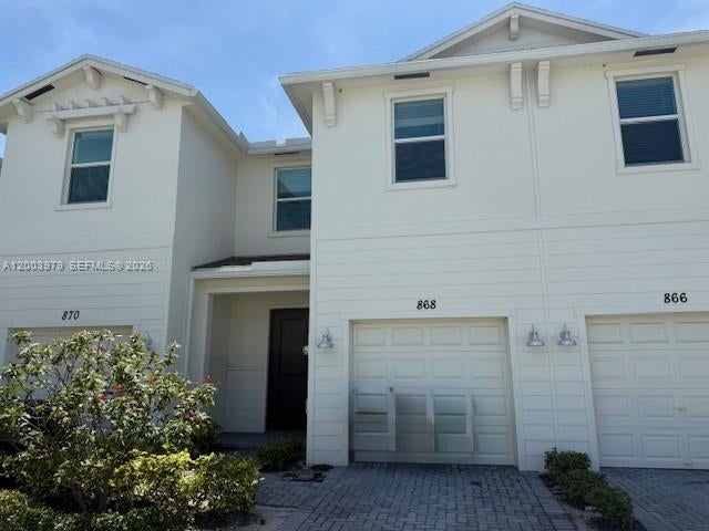 Photo of 868 SE Grovebush Lane, Port Saint Lucie, FL 34984 (MLS # A12003979)