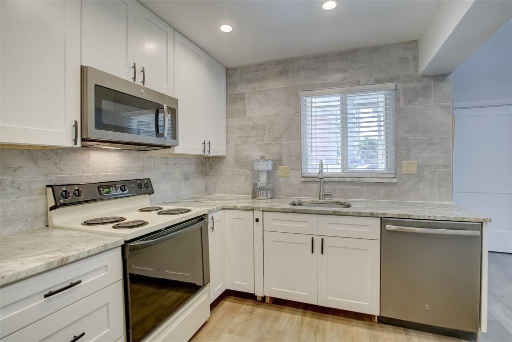 Photo of 1450 N Riverside Drive #101, Pompano Beach, FL 33062 (MLS # F10556883)