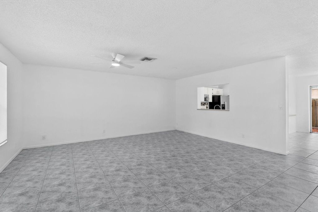 Photo of 12212 NW 36th Place, Sunrise, FL 33323 (MLS # B26033050)