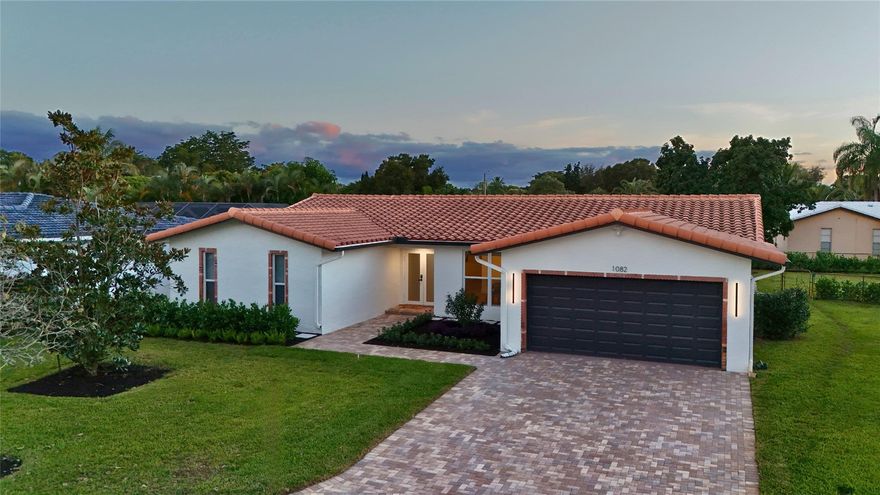 Tucked at the end of a quiet cul-de-sac in Coral Springs, this 4BR/2BA pool home offers a setting that feels peaceful from the moment you arrive. Inside, white oak luxury vinyl flooring flows through spacious living areas, leading to a kitchen designed for everyday gathering with quartz countertops, white oak cabinetry, stainless steel appliances, and a stylish hood that anchors the space. Impact windows and doors keep the home bright and provide peace of mind. Your backyard features a covered patio for morning coffee, a sparkling pool for weekend fun, and plenty of room to unwind as the sun sets. With 2,200 sqft under air and NO HOA, you have the freedom to truly make the home your own. Here, everyday living feels balanced, relaxed, and connected to everything South Florida has to offer!