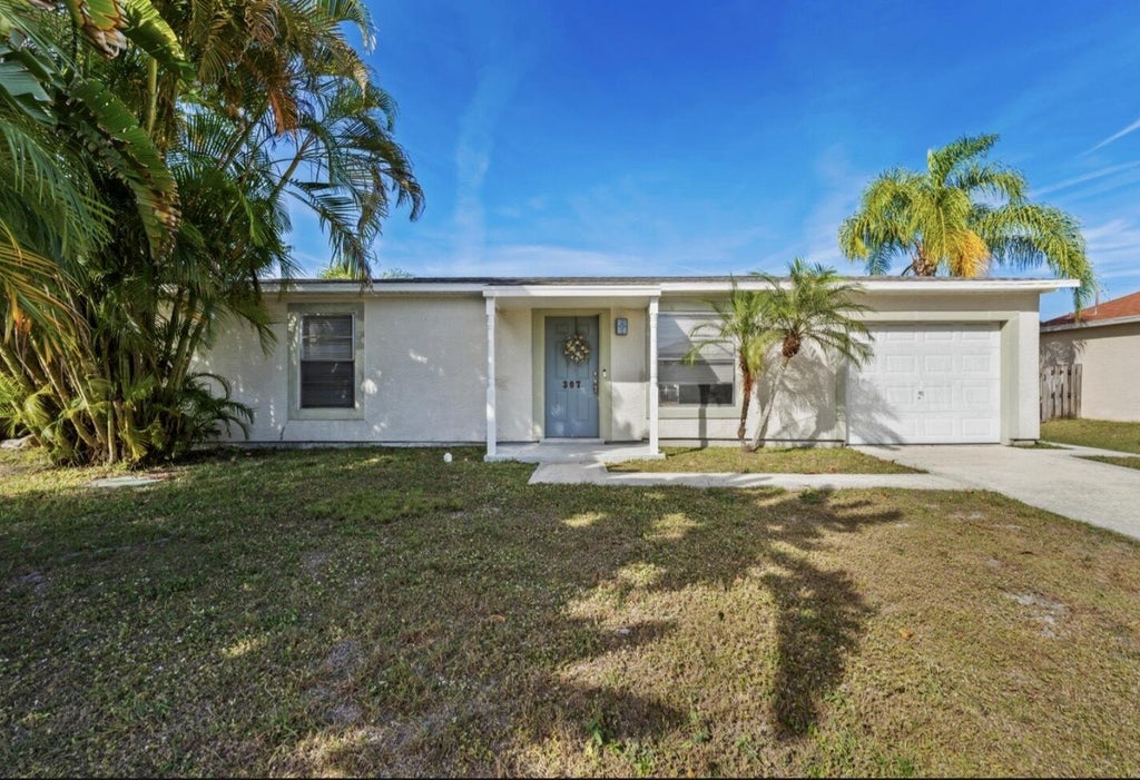Photo of 307 SE Husted Terrace, Port Saint Lucie, FL 34983 (MLS # B26080837)