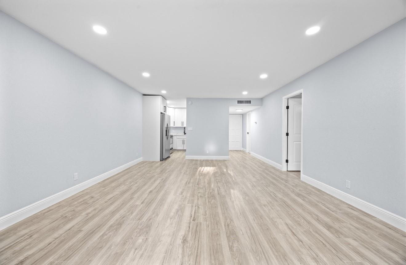 Beautifully Remodeled 1-Bedroom in Active Gated Community Welcome to this stunning ground-floor 1-bedroom, 1.5-bathroom unit, fully remodeled w/ brand-new laminate flooring throughout, a sleek white kitchen w/ quartz countertop, stainless steel appliances, & recessed lighting under smooth ceilings. The open living space flows seamlessly to a screened-in patio overlooking the sparkling community pool.
The spacious primary suite features a large walk-in closet and an elegantly updated en-suite bathroom with modern fixtures. Additional highlights include a stylish powder room for guests and plenty of storage.
Set in an active, gated community offering scenic walking trails, peaceful lakes, and a vibrant social scene, this turnkey unit blends comfort, style, and convenience.
