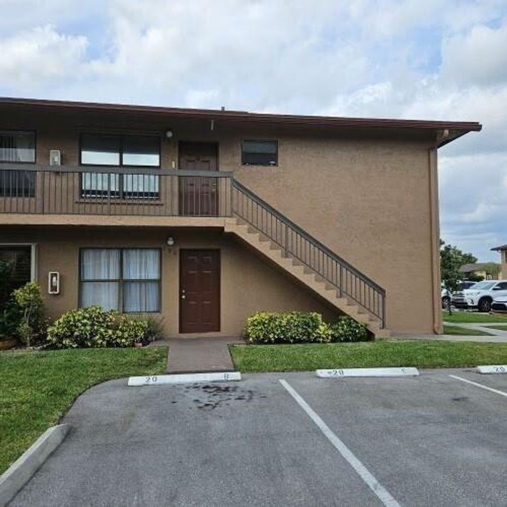 Photo of 10039 Winding Lake Road #202, Sunrise, FL 33351 (MLS # B26032395)