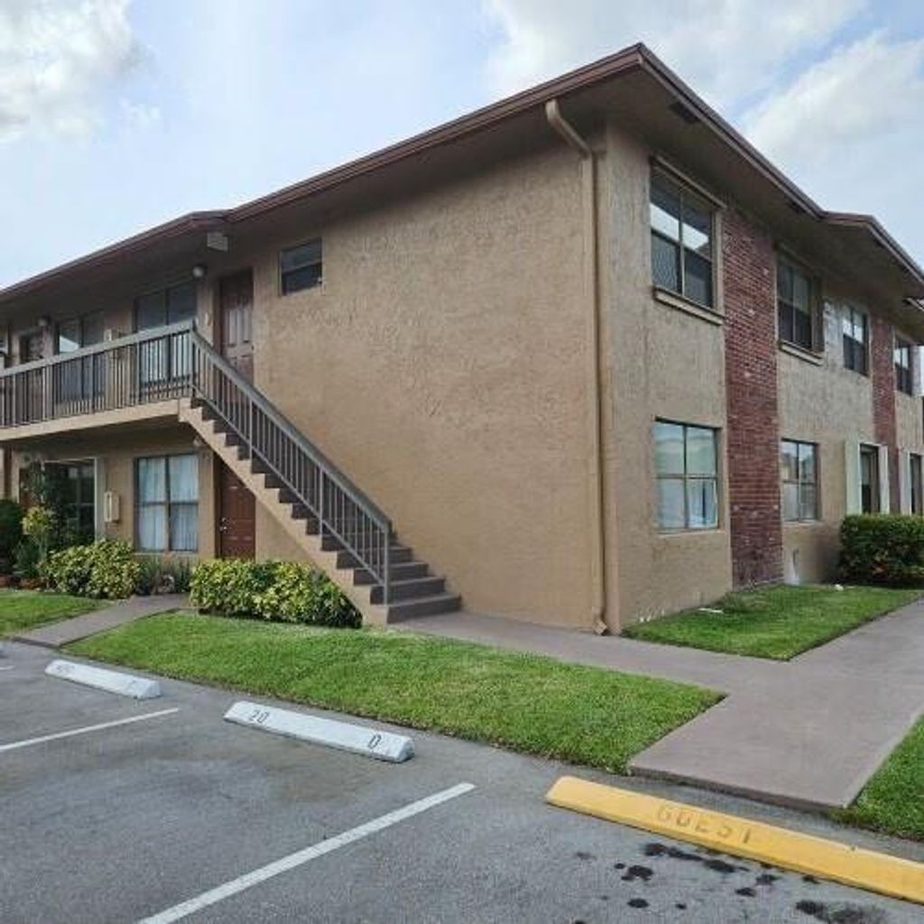 Photo of 10039 Winding Lake Road #202, Sunrise, FL 33351 (MLS # B26032395)