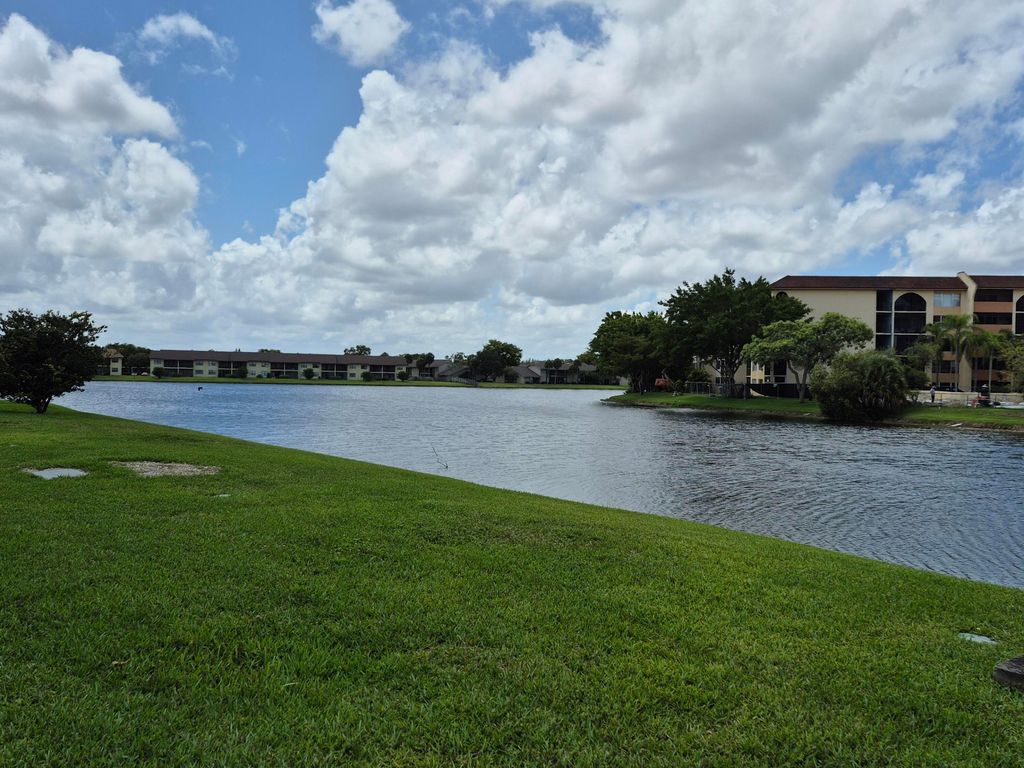 Photo of 10039 Winding Lake Road #202, Sunrise, FL 33351 (MLS # B26032395)