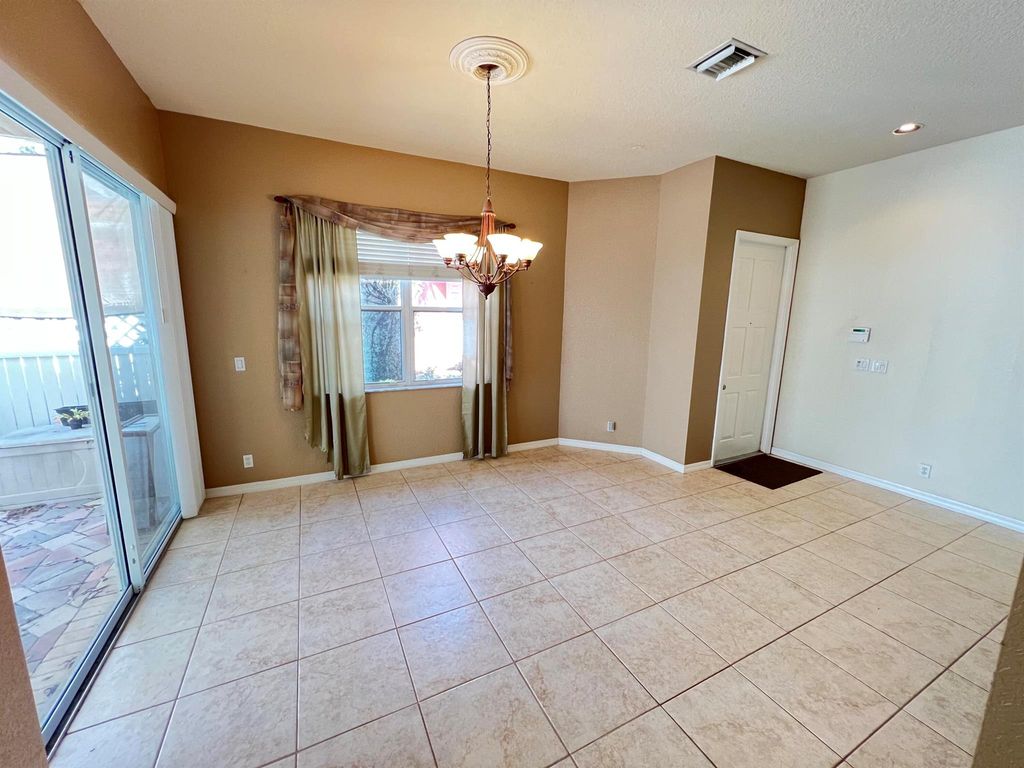 Photo of 5542 Boynton Gardens Drive, Boynton Beach, FL 33437 (MLS # R11112954)