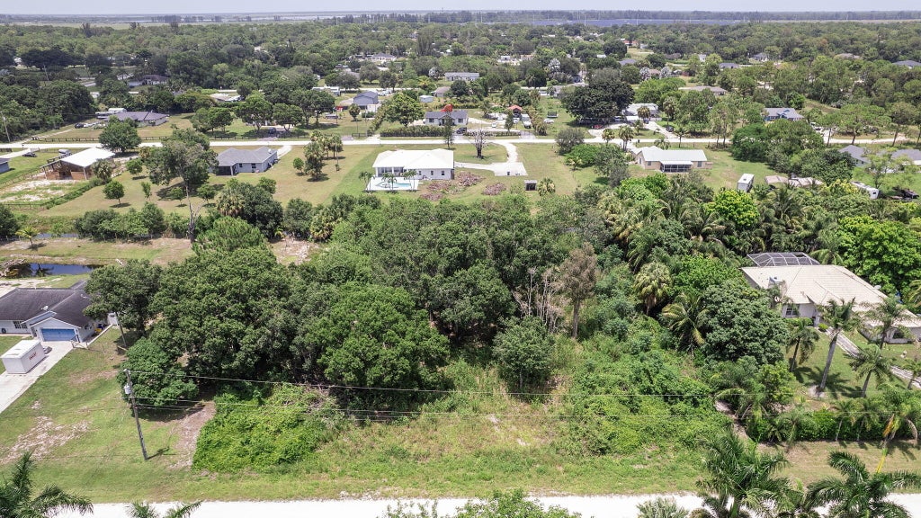 Photo of 18853 42nd Road N, The Acreage, FL 33470 (MLS # R11110634)