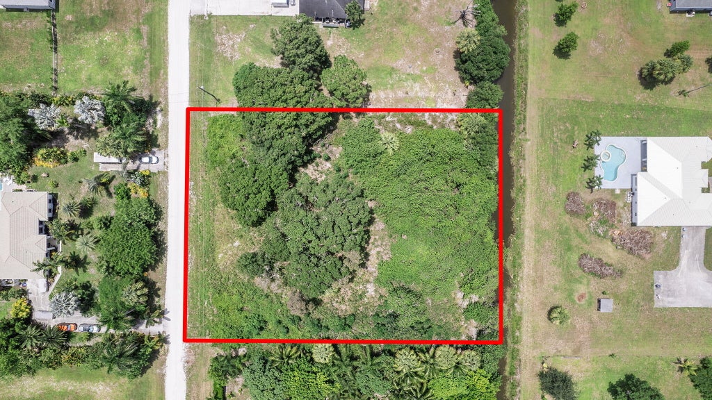 Photo of 18853 42nd Road N, The Acreage, FL 33470 (MLS # R11110634)