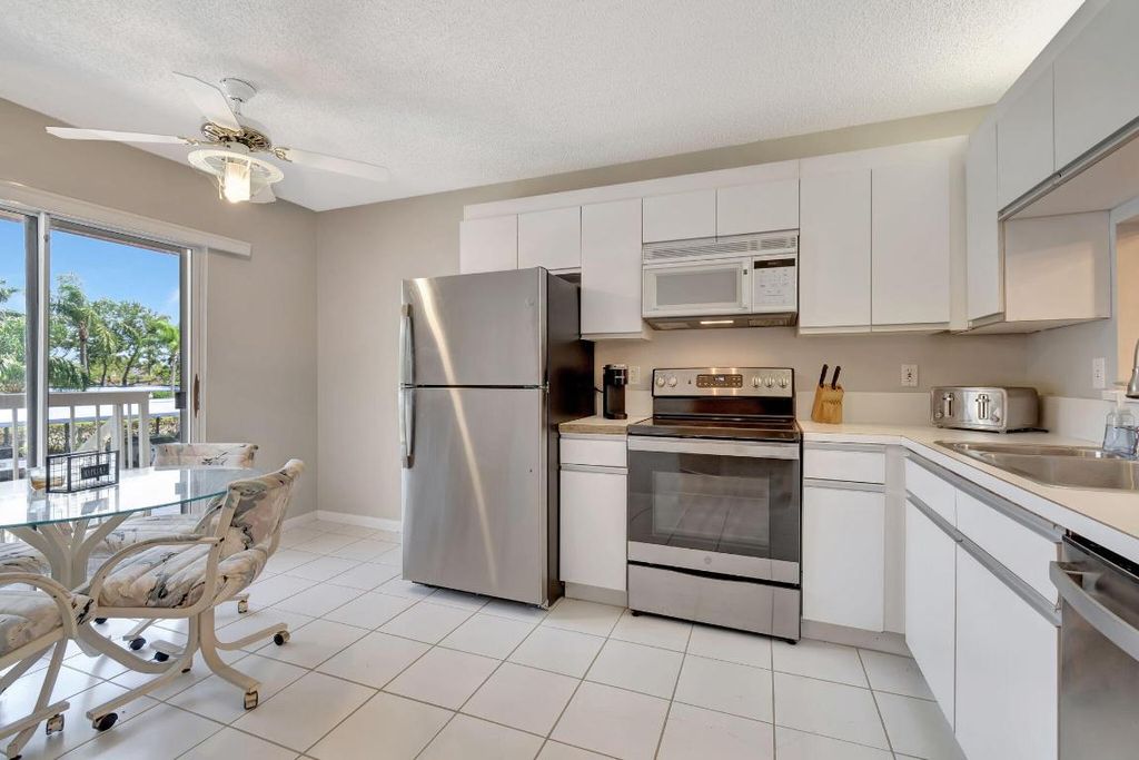 Photo of 280 NW 67th Street #B207, Boca Raton, FL 33487 (MLS # R11153043)