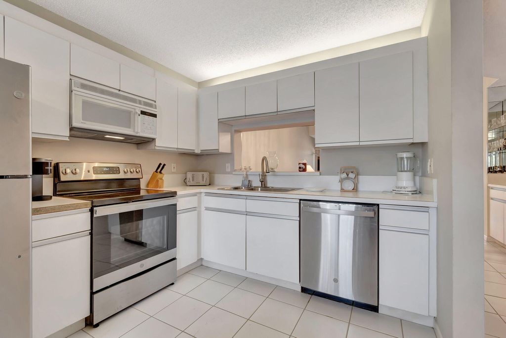 Photo of 280 NW 67th Street #B207, Boca Raton, FL 33487 (MLS # R11153043)