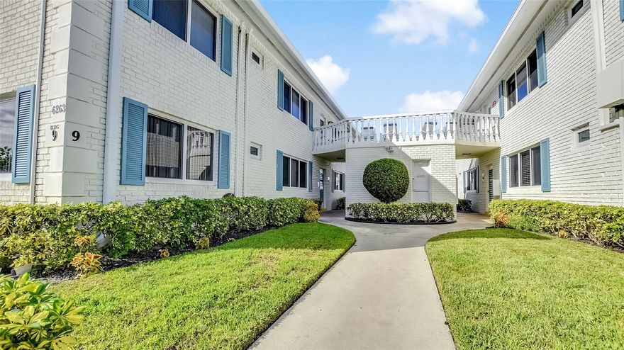 Affordable South Florida living! This furnished 1-bedroom, 1-bath unit is located on the 2nd floor in the Georgian Courts 55+ side. All assessments paid! Enjoy a community pool and a peaceful setting nestled in a quiet residential neighborhood. Prime east side location close to shopping, dining, and the beach. Easy to show!