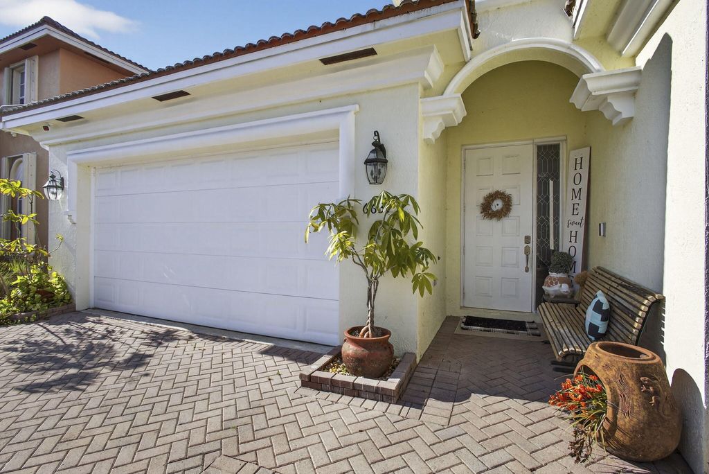 Photo of 6637 Traveler Road, West Palm Beach, FL 33411 (MLS # R11166086)