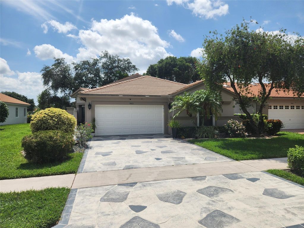 Photo of 9883 Harbour Lake Cir, Boynton Beach, FL 33437 (MLS # F10501616)